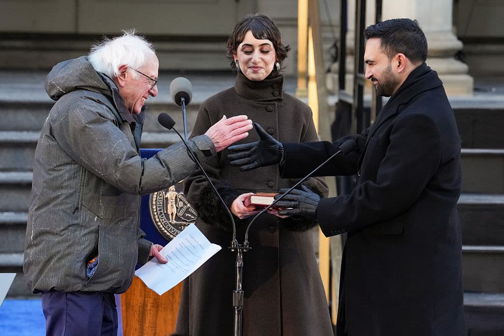 David Dee Delgado/Getty Images Senator Bernie Sanders shakes hands with Mayor Zohran Mamdani after his ceremonial inauguration at City Hall, January 1, 2026.