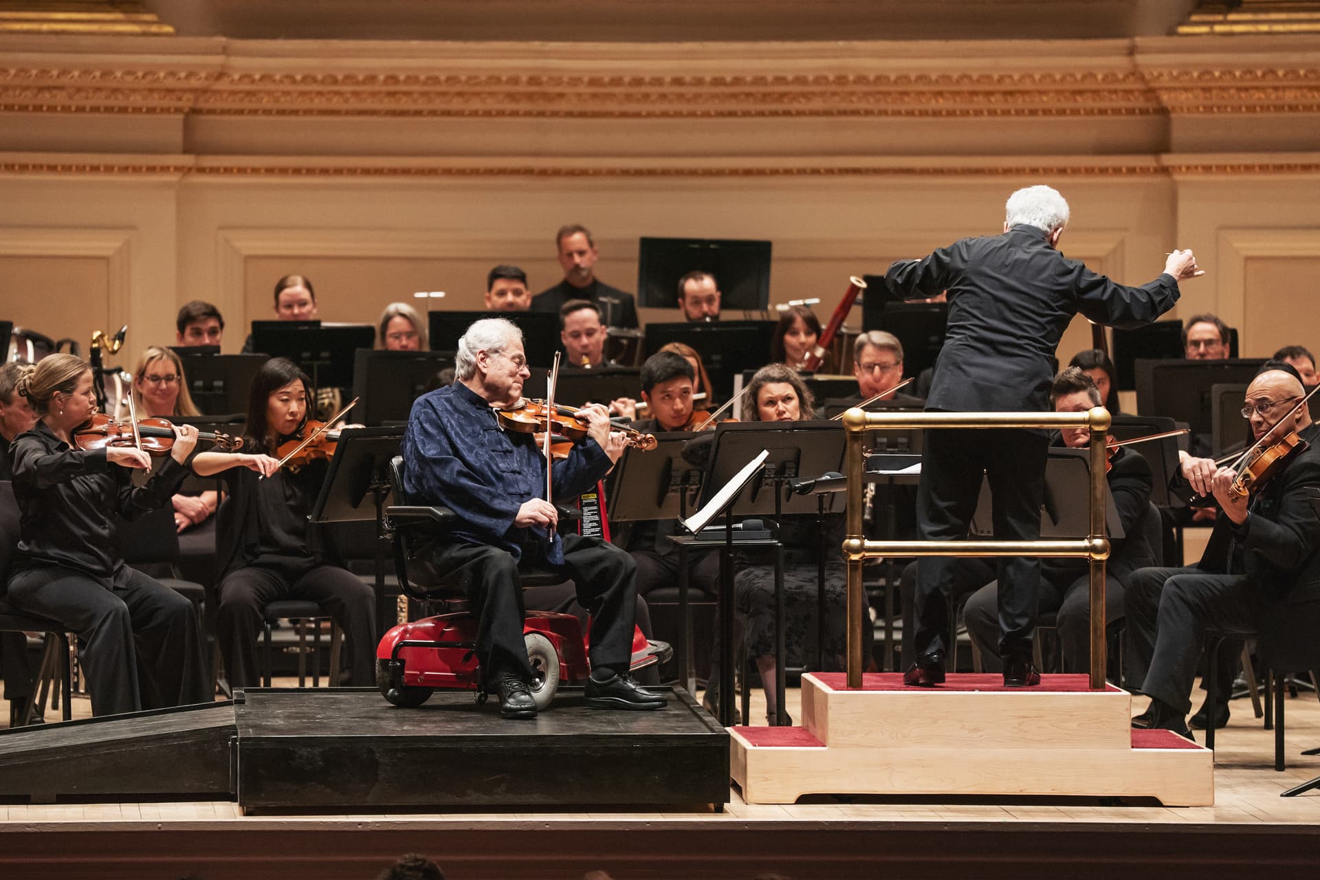 Amanda Tipton Photography via Carnegie Hall Music Director Peter Oundjian conducting the Colorado Symphony with Itzhak Perlman