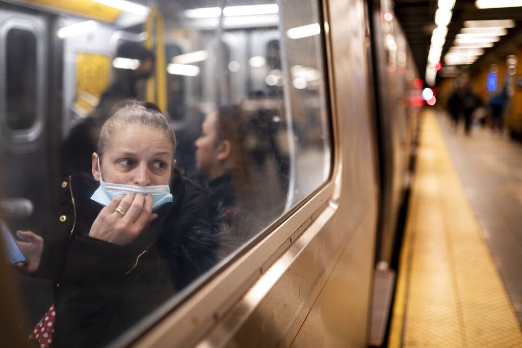 A passenger looks out onto the platform at the 36th Street subway station, where a shooting attack occurred the previous day, April 13, 2022. AP/John Minchillo, file