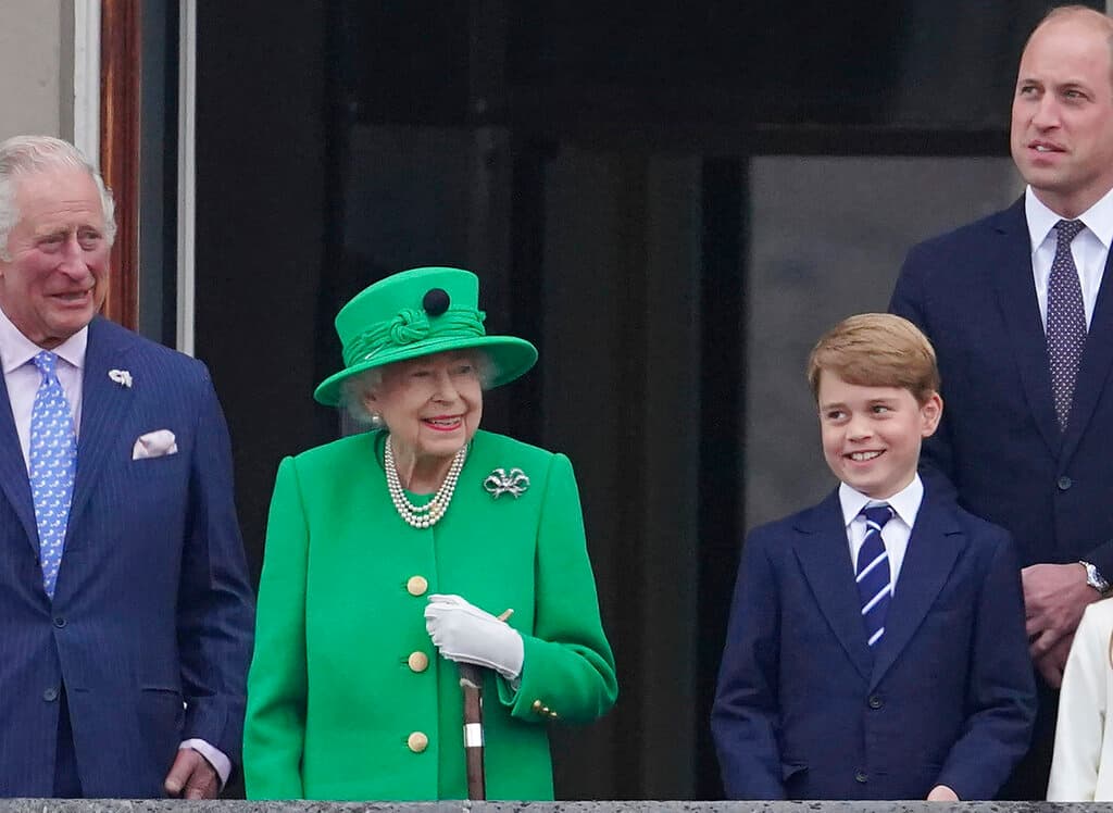Prince Charles, Queen Elizabeth II, Prince George, and Prince William appear on the balcony of Buckingham Palace June 5, 2022. 