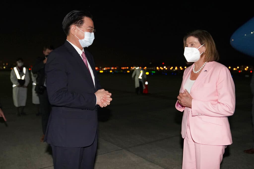 Speaker Pelosi is greeted by Taiwan's foreign minister, Joseph Wu, as she arrives at Taipei August 2, 2022. 