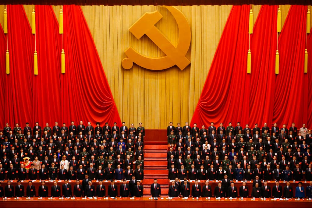 President Xi Jinping, front row center, stands with his cadres during the closing ceremony for the 19th Party Congress at Beijing on October 24, 2017. 