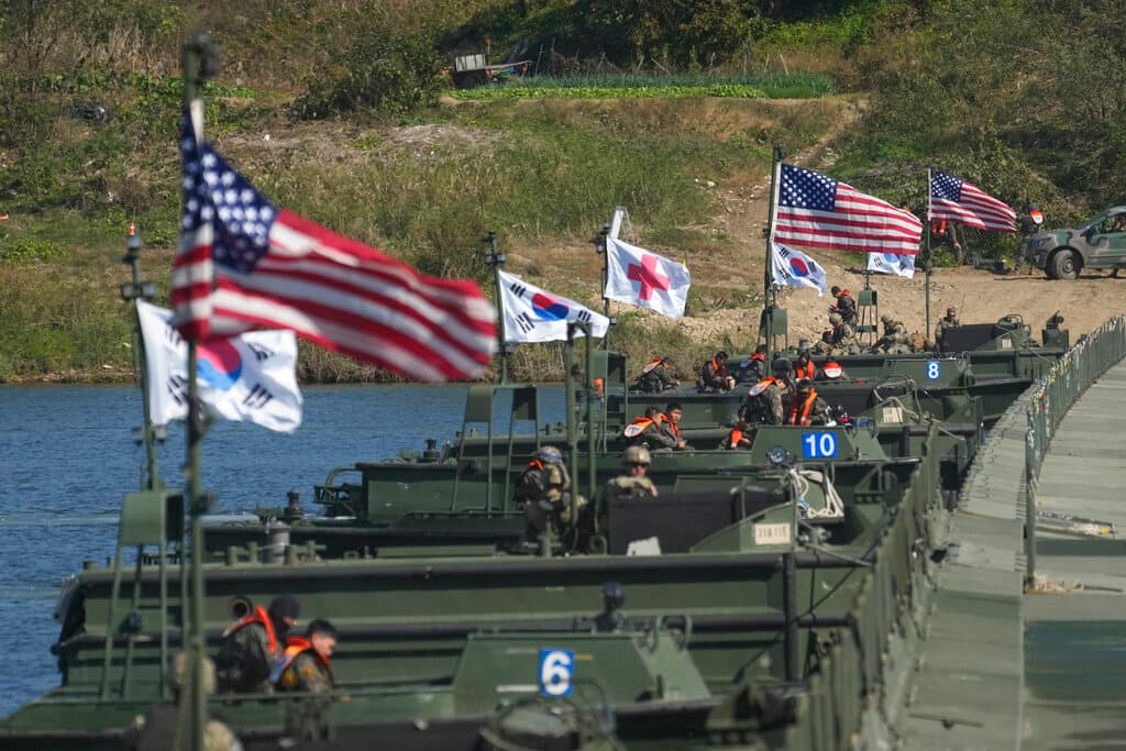 American and South Korean flags flutter before a joint river-crossing drill at Yeoju, South Korea, October 19, 2022. 