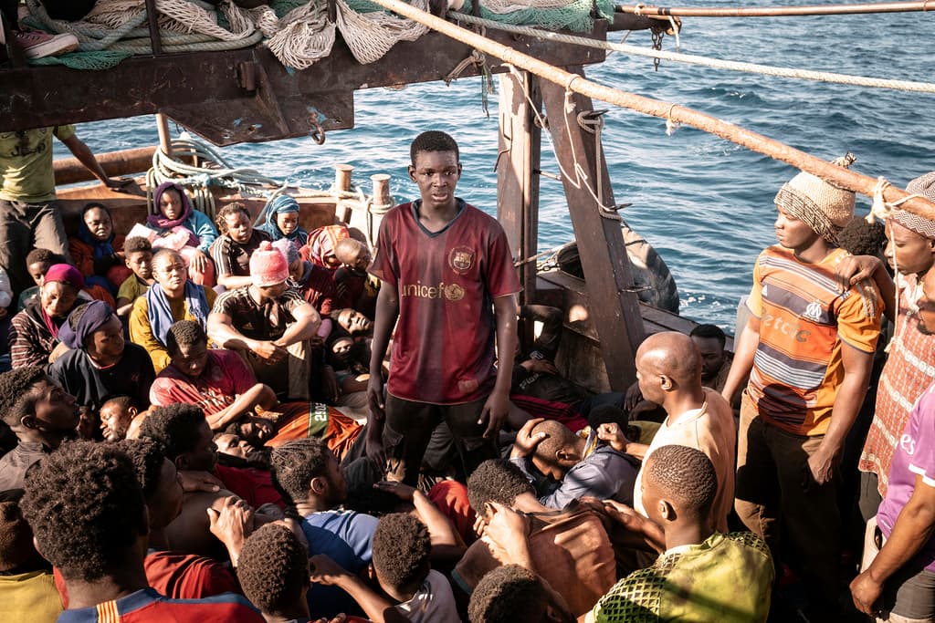 A scene from the Italian film 'lo Capitano,' depicting the journey of migrants to Italy from Senegal.