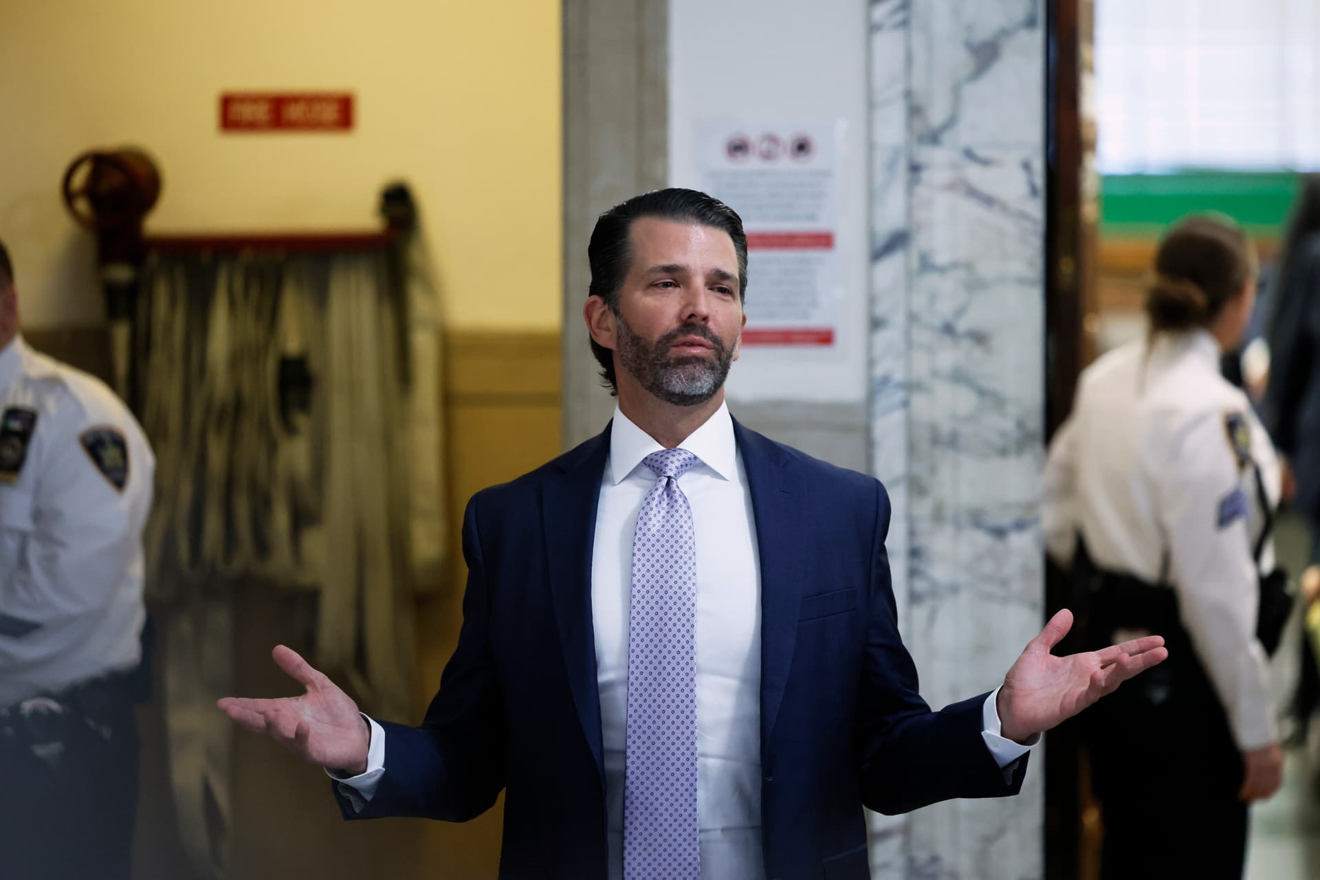 Donald Trump Jr. speaks as he leaves the courtroom after testifying in his civil fraud trial at New York State Supreme Court on November 13, 2023 in New York City.  