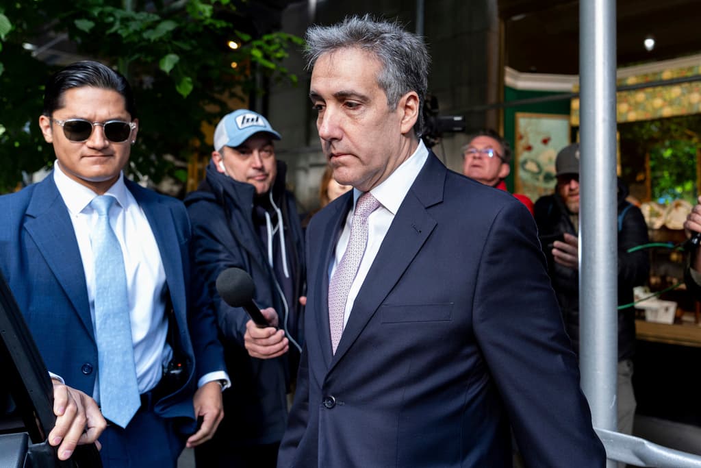 Michael Cohen leaves his apartment building on his way to Manhattan criminal court, May 13, 2024.