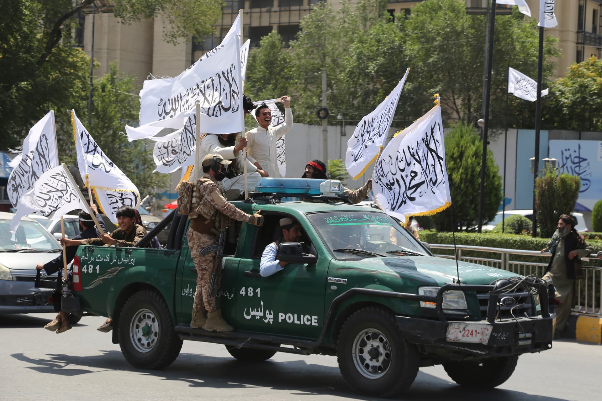 Taliban fighters celebrate the third anniversary of the withdrawal of American troops from Afghanistan, at Kabul, August 14, 2024. 