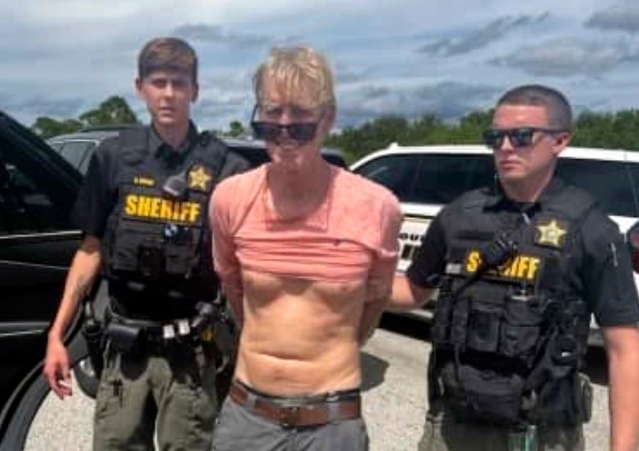 Law enforcement officers in Florida arrest Ryan Routh, the man suspected in the apparent assassination attempt of President Trump, September 15, 2024.