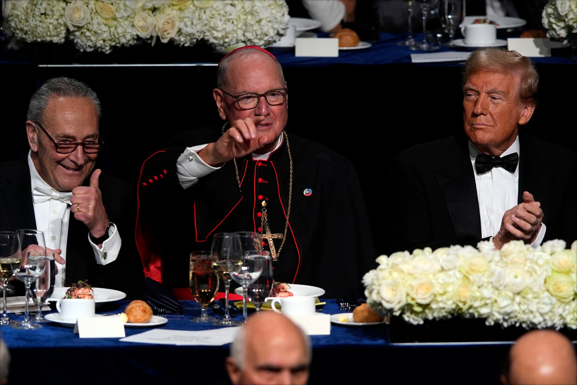 Senator Schumer, left, Timothy Cardinal Dolan, center, and President Trump at the Al Smith Memorial Foundation Dinner, October 17, 2024, at New York. 
