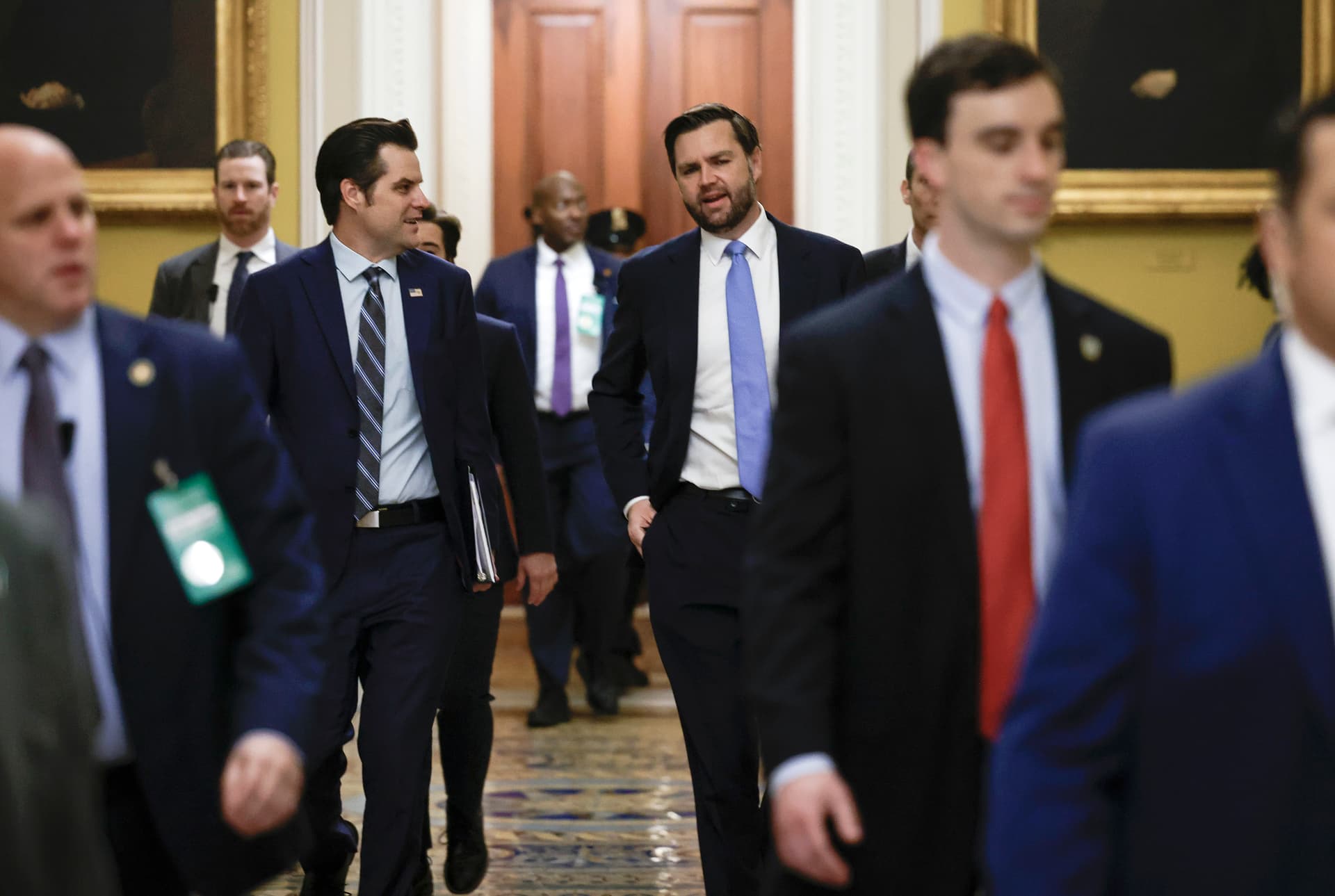 Former U.S. Rep. Matt Gaetz (R-FL) (L) walks with Vice President-elect JD Vance as they arrive for meetings with Senators at the U.S. Capitol on November 20, 2024 at Washington, DC. 