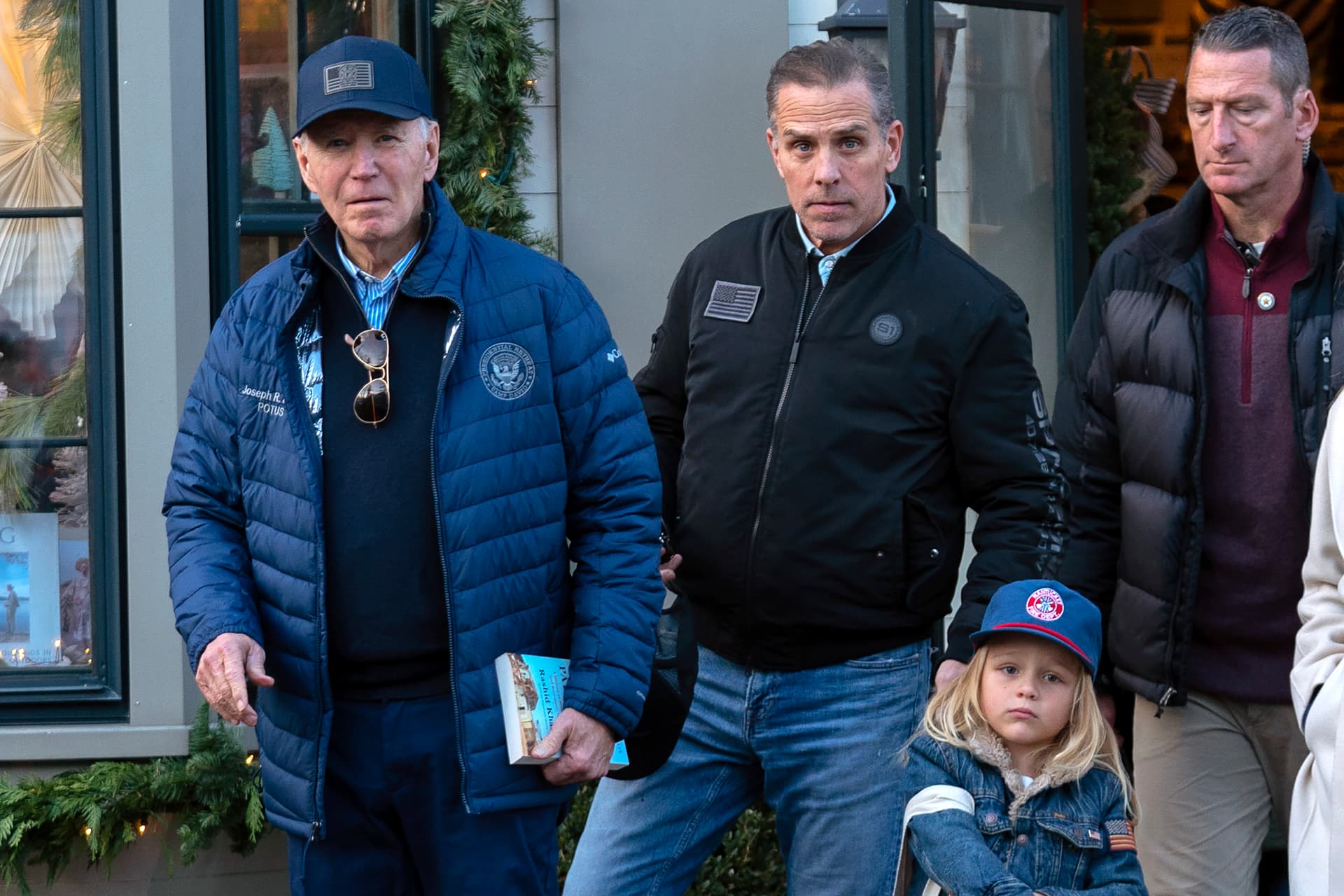 President Biden accompanied by his son Hunter Biden and his grandson Beau leave a book store at downtown Nantucket Massachusetts, November 29, 2024. 