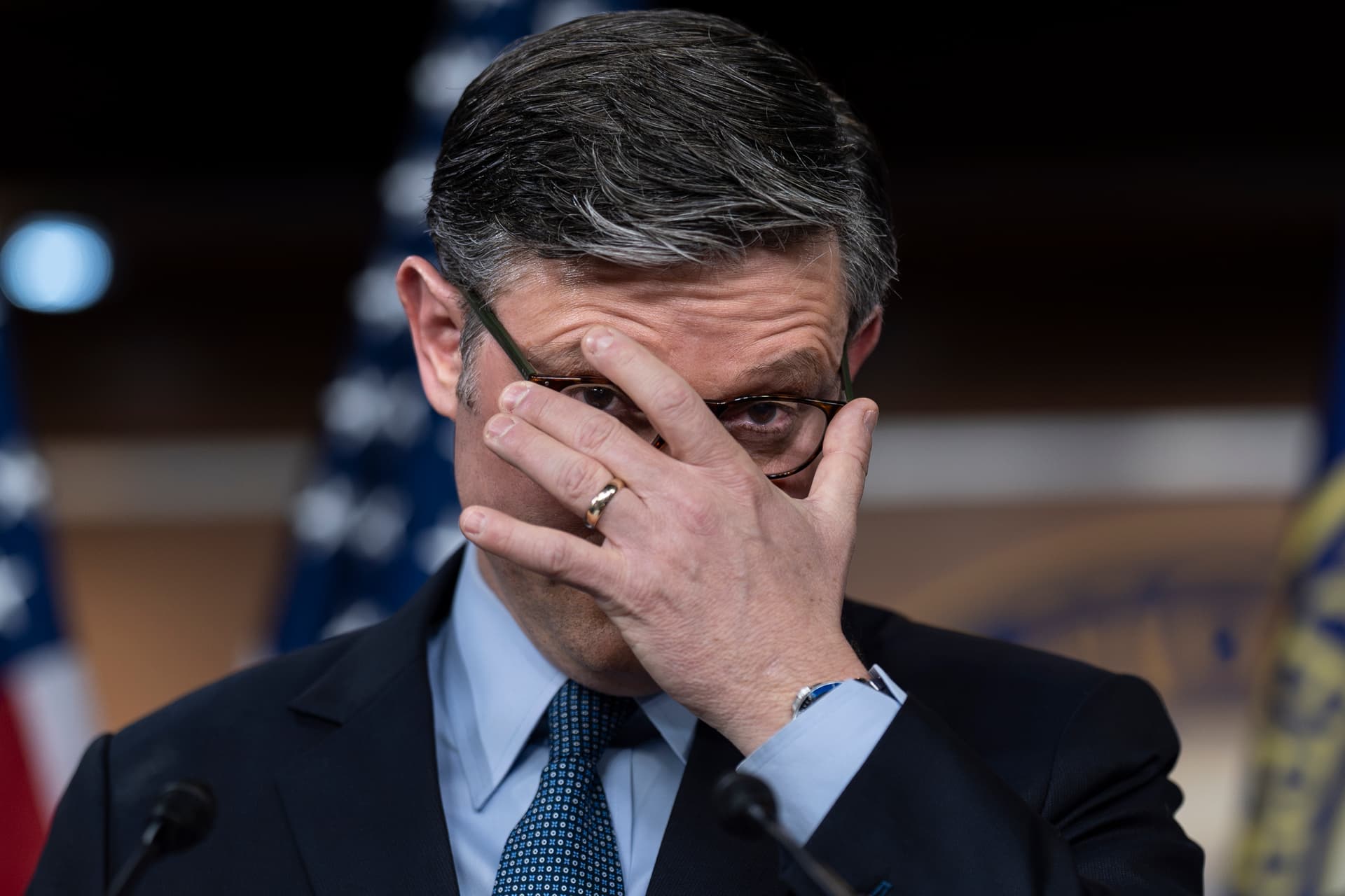 House Speaker Johnson takes questions from reporters after presenting his final version of an interim pending bill at the Capitol December 17, 2024. 