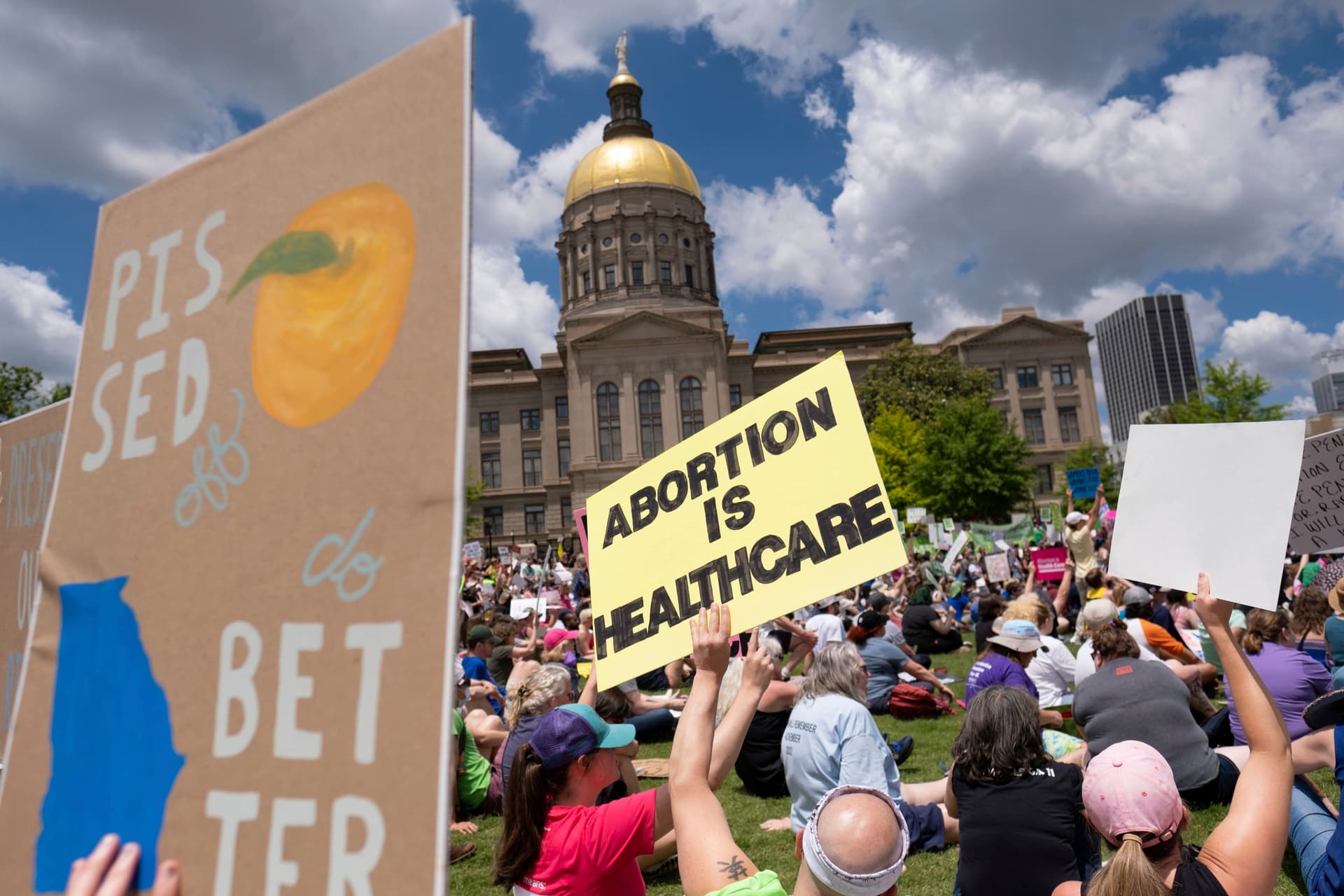 Abortion rights protesters rally near the Georgia state Capitol at Atlanta.