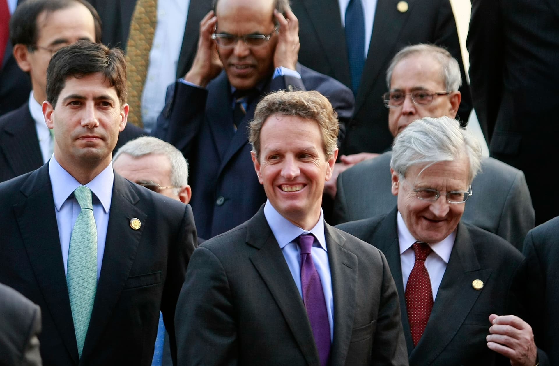 A Federal Reserve board member, Kevin Warsh, left, and Treasury Secretary Timothy Geithner, center, in 2010 at Busan, South Korea.