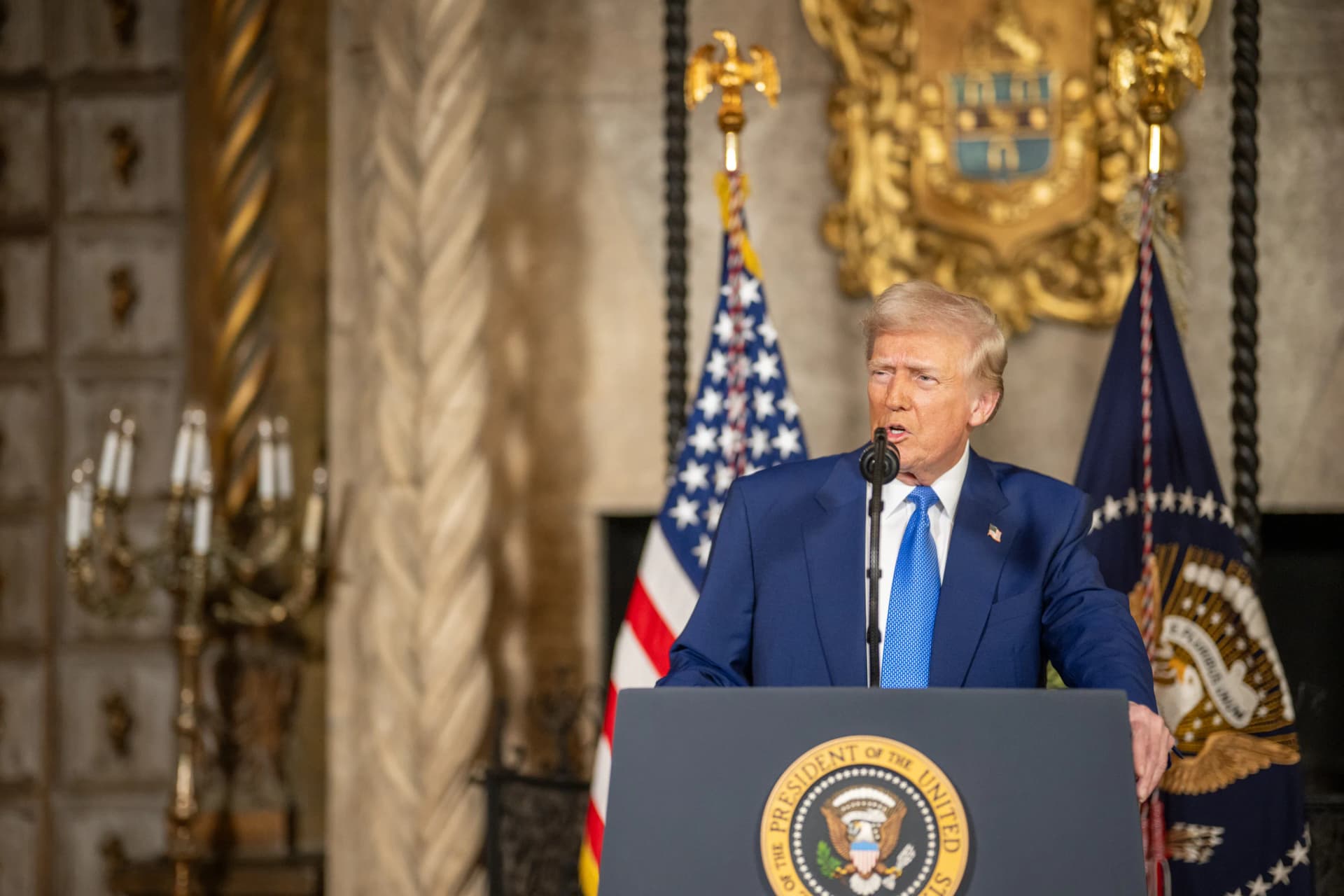 President Trump appears at his Mar-a-Lago home at Palm Beach to sign an executive order.