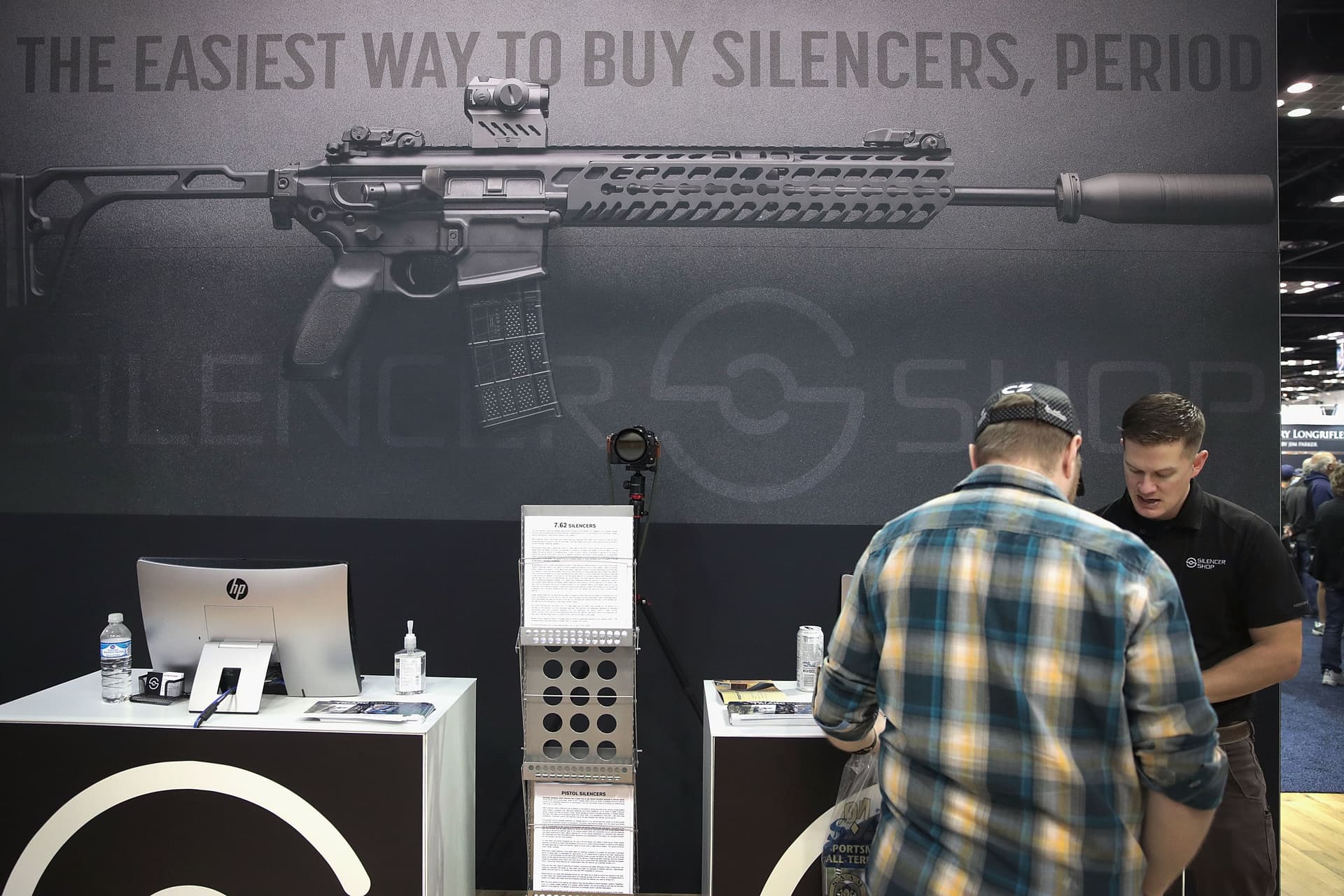 A guest looks over silencers at the Silencer Shop booth at the 148th NRA Annual Meetings & Exhibits on April 27, 2019 in Indianapolis, Indiana. 