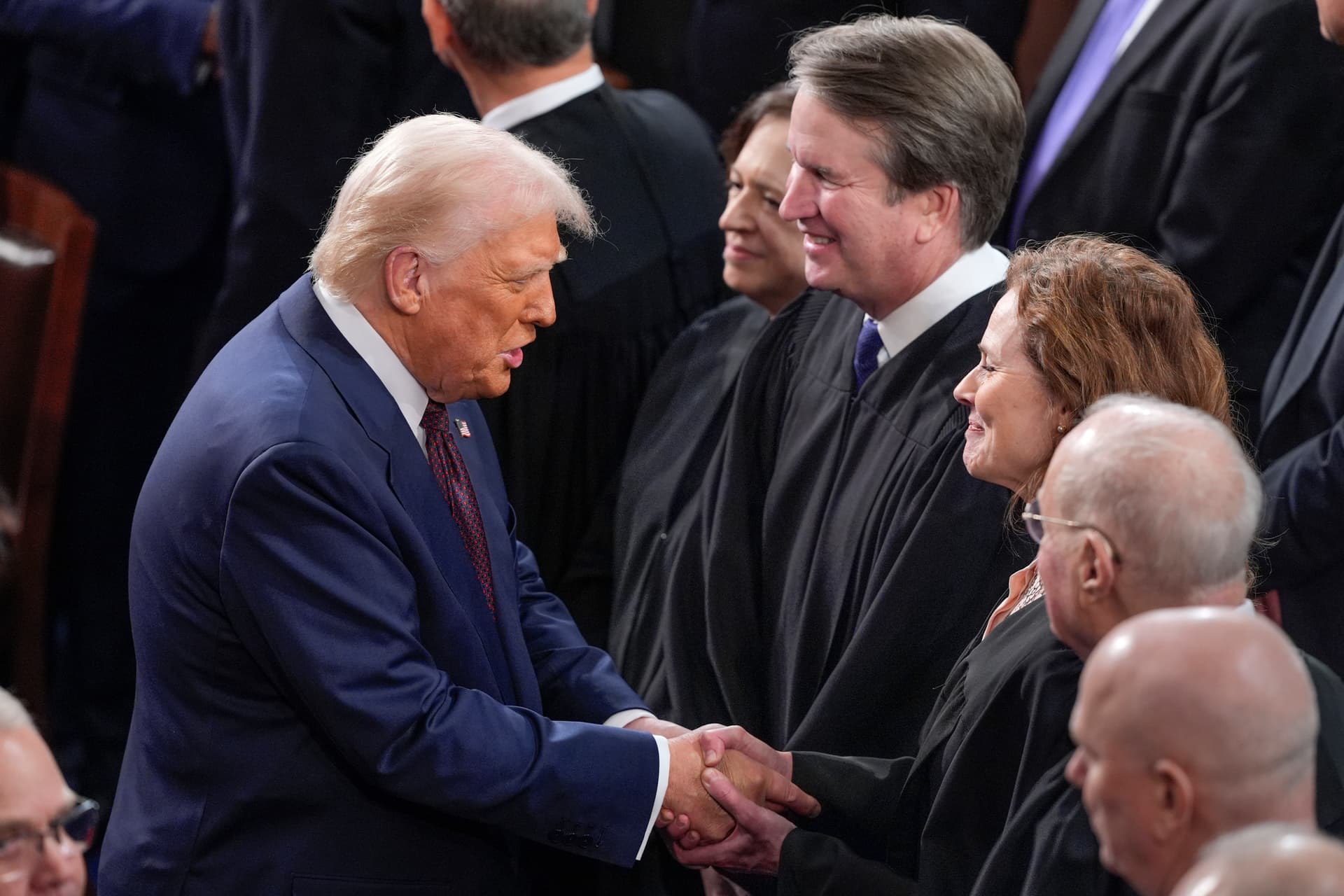 President Trump greets justices of the Supreme Court.