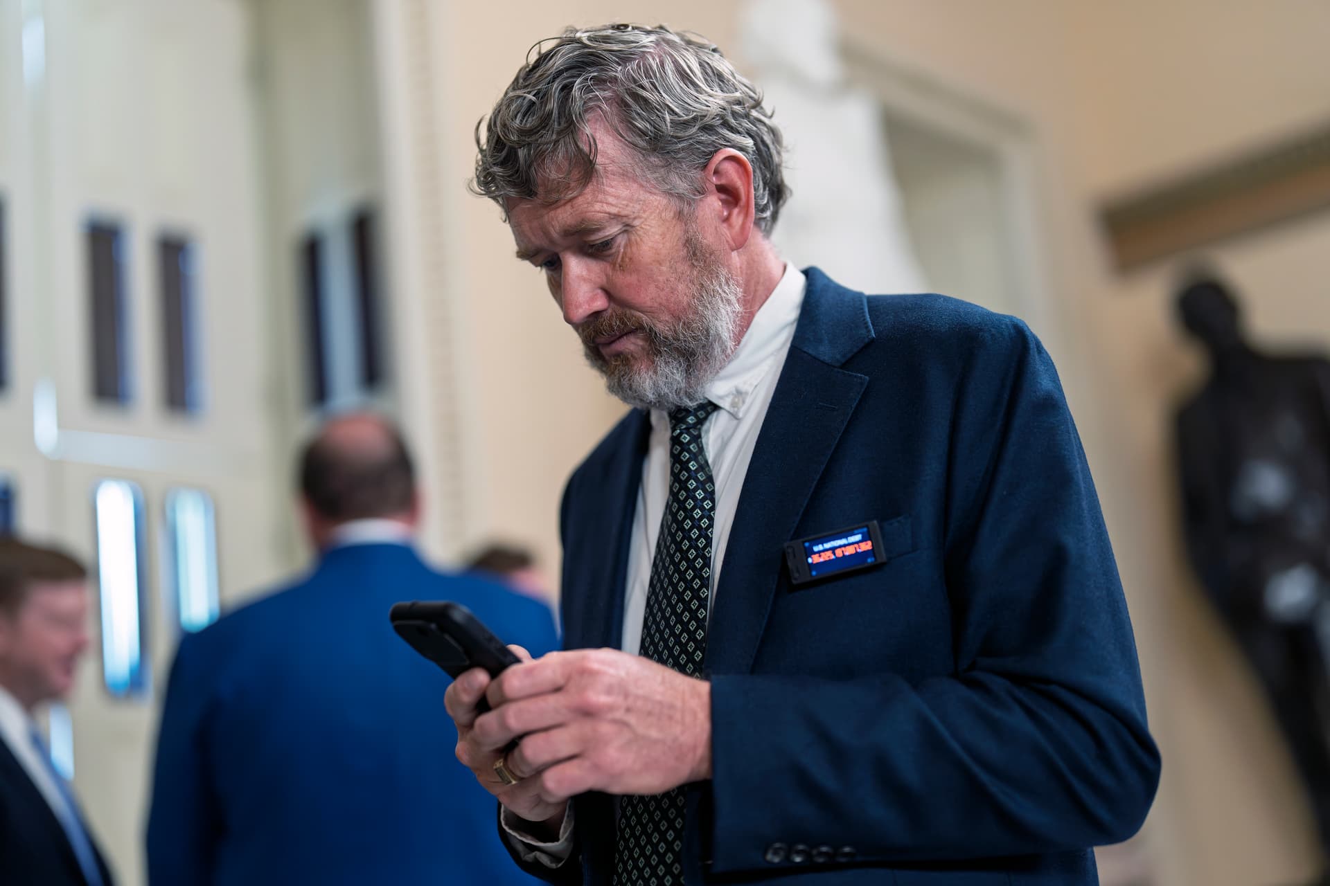 Representative Thomas Massie walks to the House chamber amid debate on President Trump's signature tax and spending bill on July 2, 2025. 