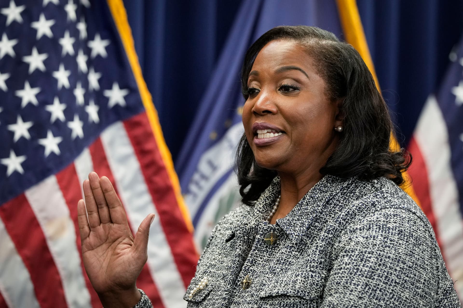 Lisa Cook takes the oath of office to serve as a member of the Board of Governors at the Federal Reserve System during a ceremony at the William McChesney Martin Jr. Building of the Federal Reserve on May 23, 2022.