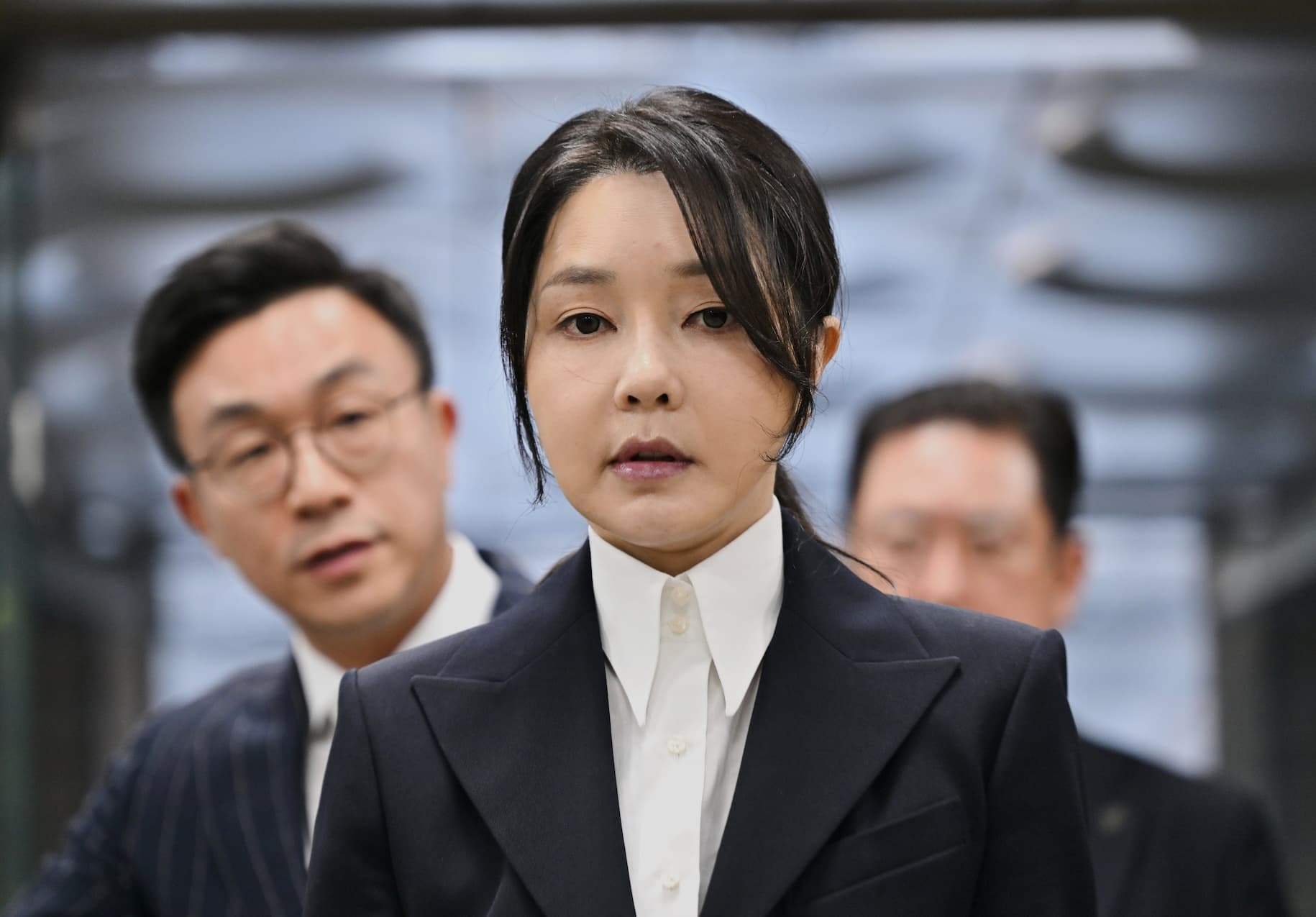 South Korea's former first lady, Kim Keon Hee, arrives at a court to attend a hearing to review her arrest warrant requested by special prosecutors, at Seoul, August 12, 2025.