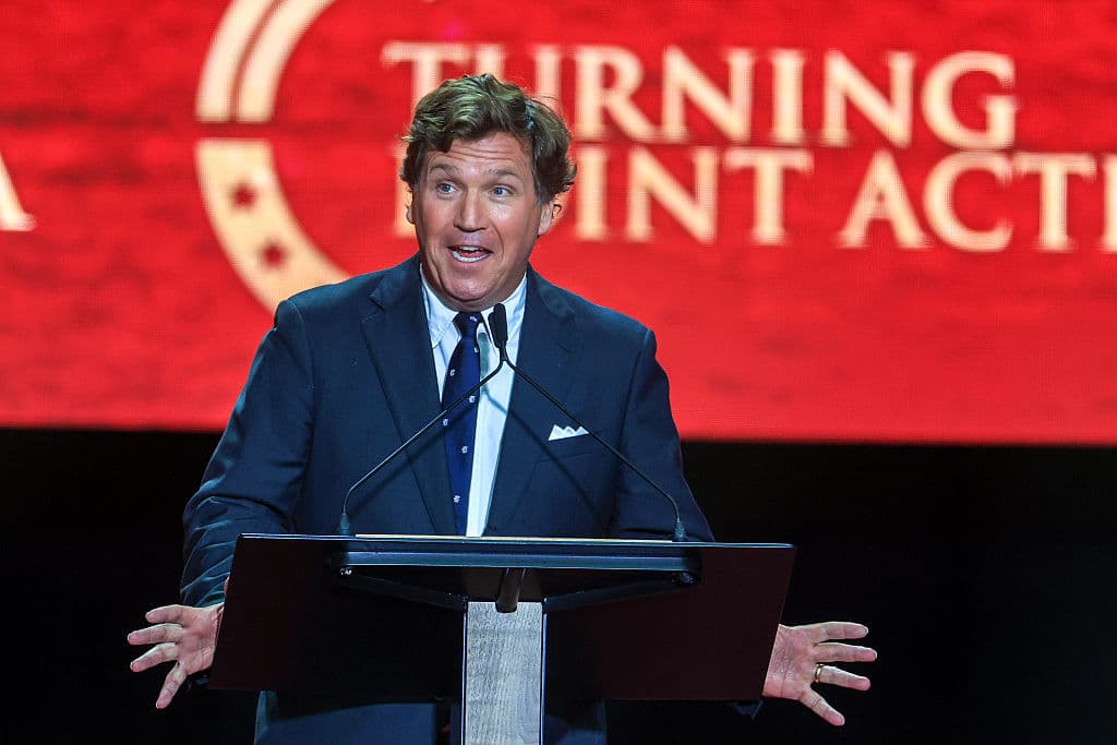 Political commentator Tucker Carlson speaks during the memorial service for political activist Charlie Kirk on September 21, 2025.