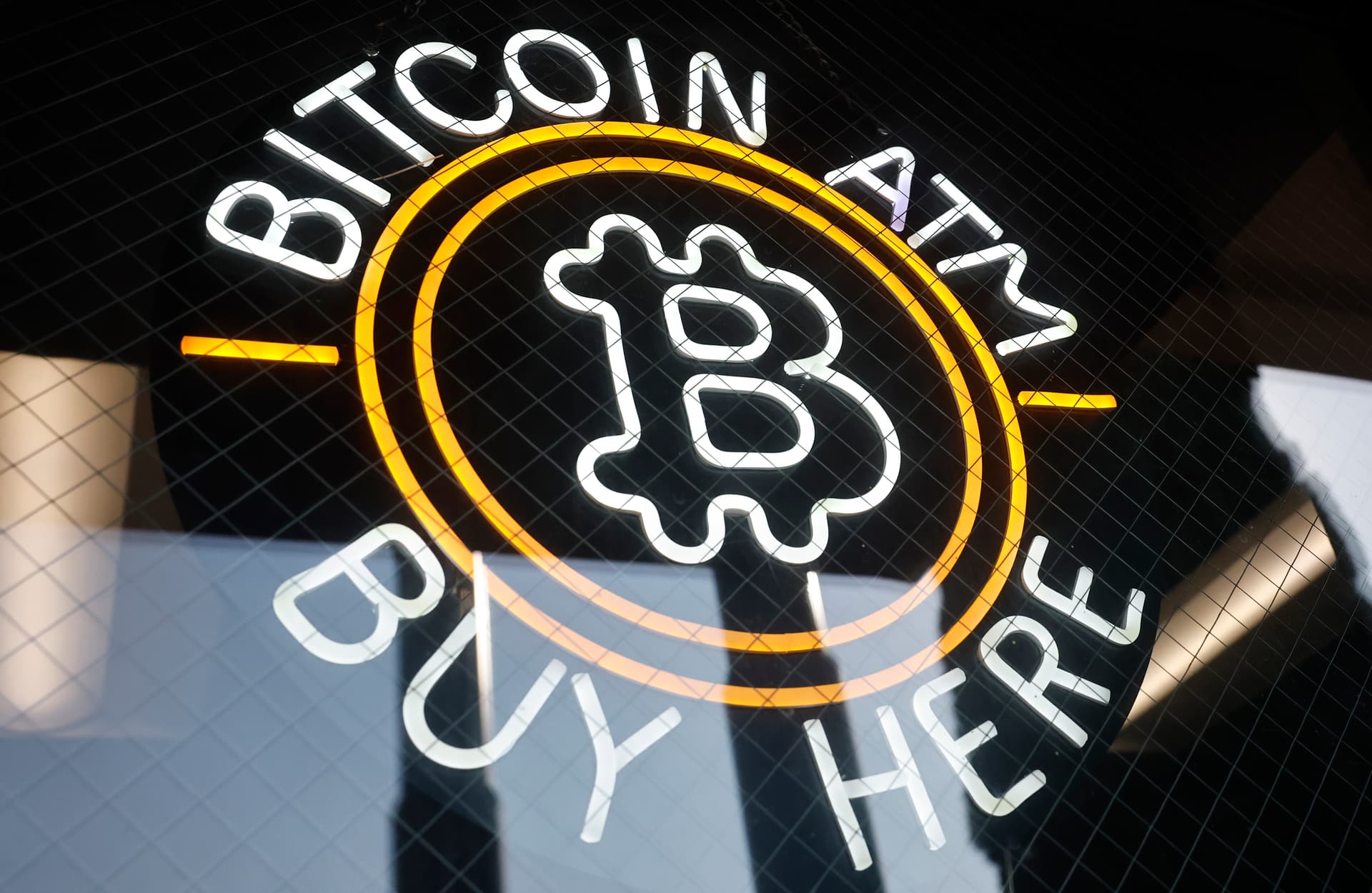 A sign advertises a Bitcoin ATM at a gas station near Pasadena, California, on July 16, 2025. 