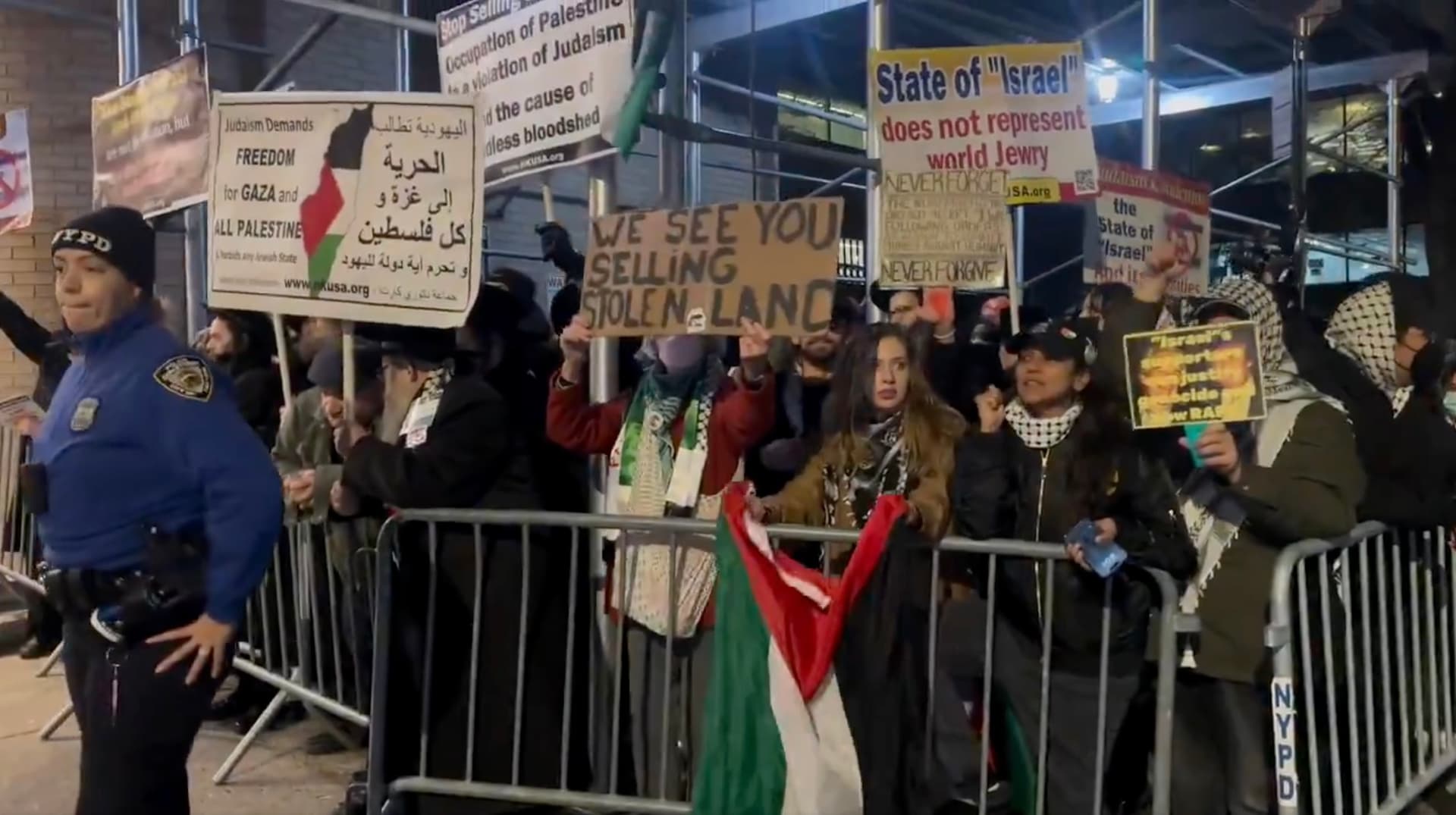 Protesters outside the Park East Synagogue at New York City.