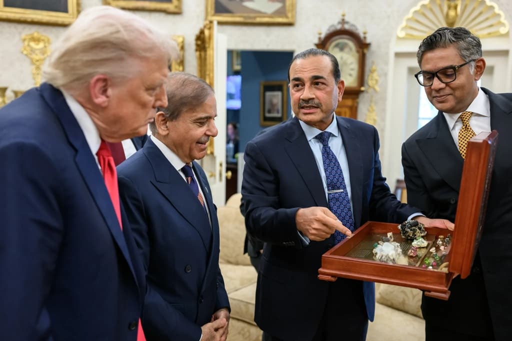 President Trump is shown rare earth minerals during an Oval Office meeting with Prime Minister Shehbaz Sharif and Field Marshal Asim Munir of Pakistan at Washington, September 26, 2025.