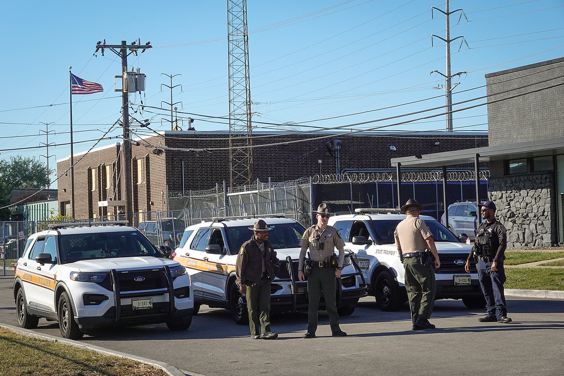 Illinois State Police stand guard at an immigration processing and detention facility on October 9, 2025, at Broadview. 