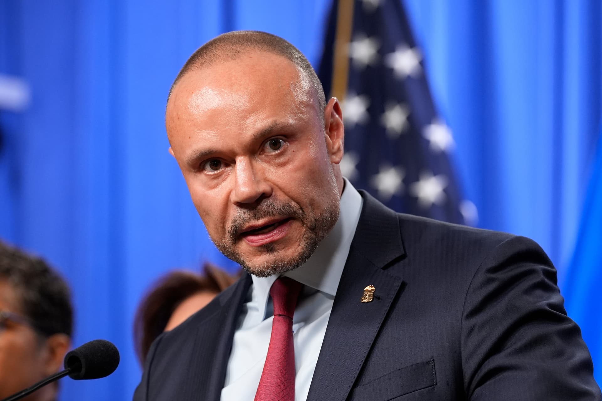 Dan Bongino, then FBI deputy director, speaks during a news conference at the Department of Justice, Dec. 4, 2025.