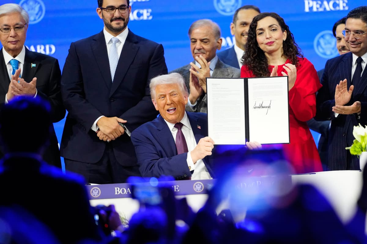President Trump holds the charter during a signing ceremony on his Board of Peace initiative at the Annual Meeting of the World Economic Forum at Davos, Switzerland.