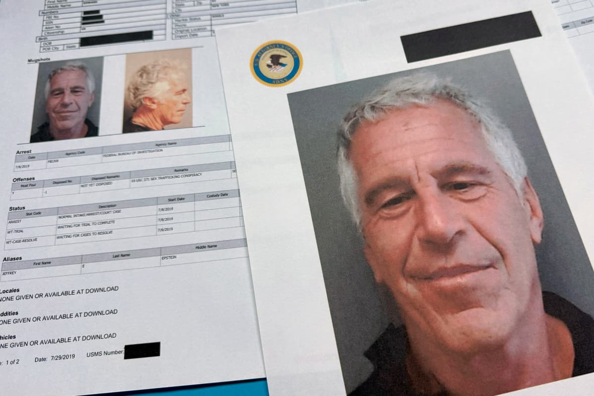 Documents that were included in the Department of Justice release of the Jeffrey Epstein files are photographed on  January 2, 2026.