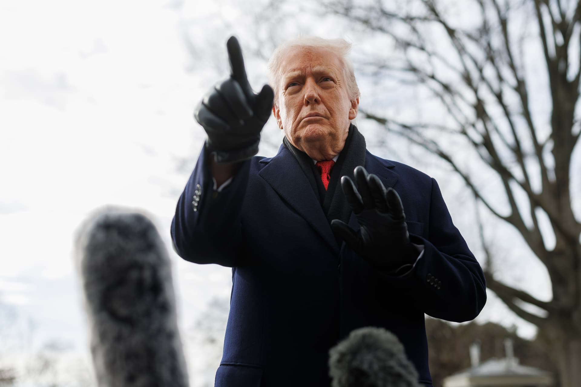 President Trump speaks to reporters on the South Lawn of the White House on January 16, 2026.