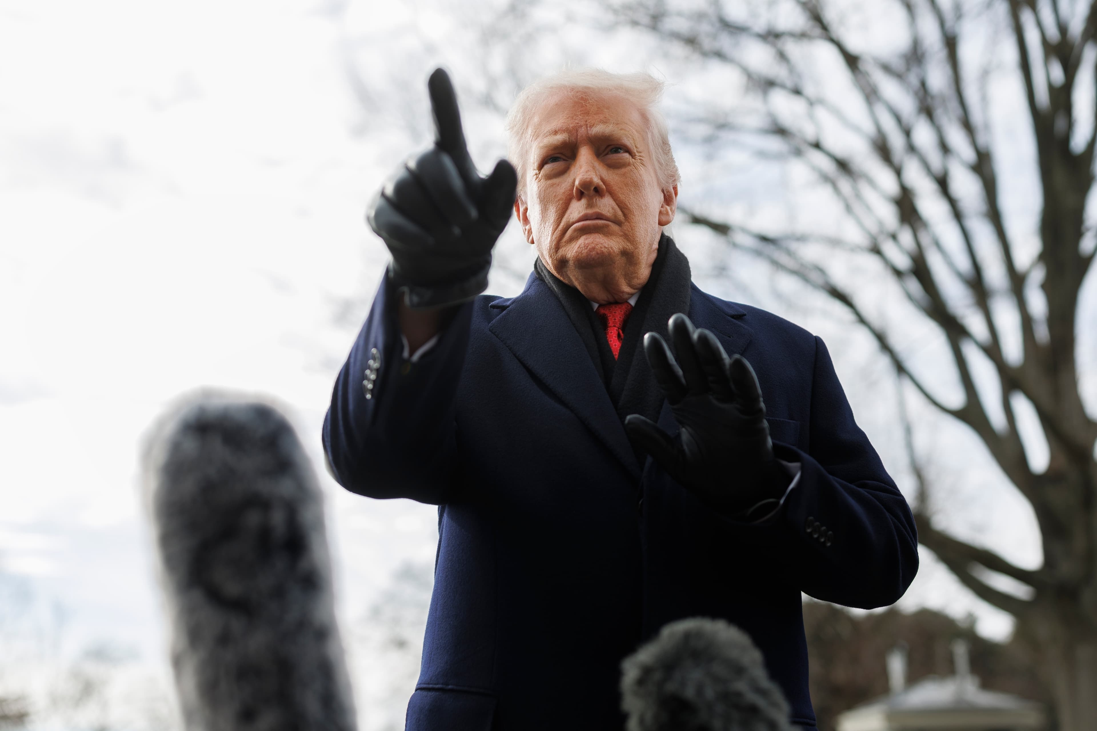 President Trump speaks to reporters on the South Lawn of the White House on January 16, 2026.