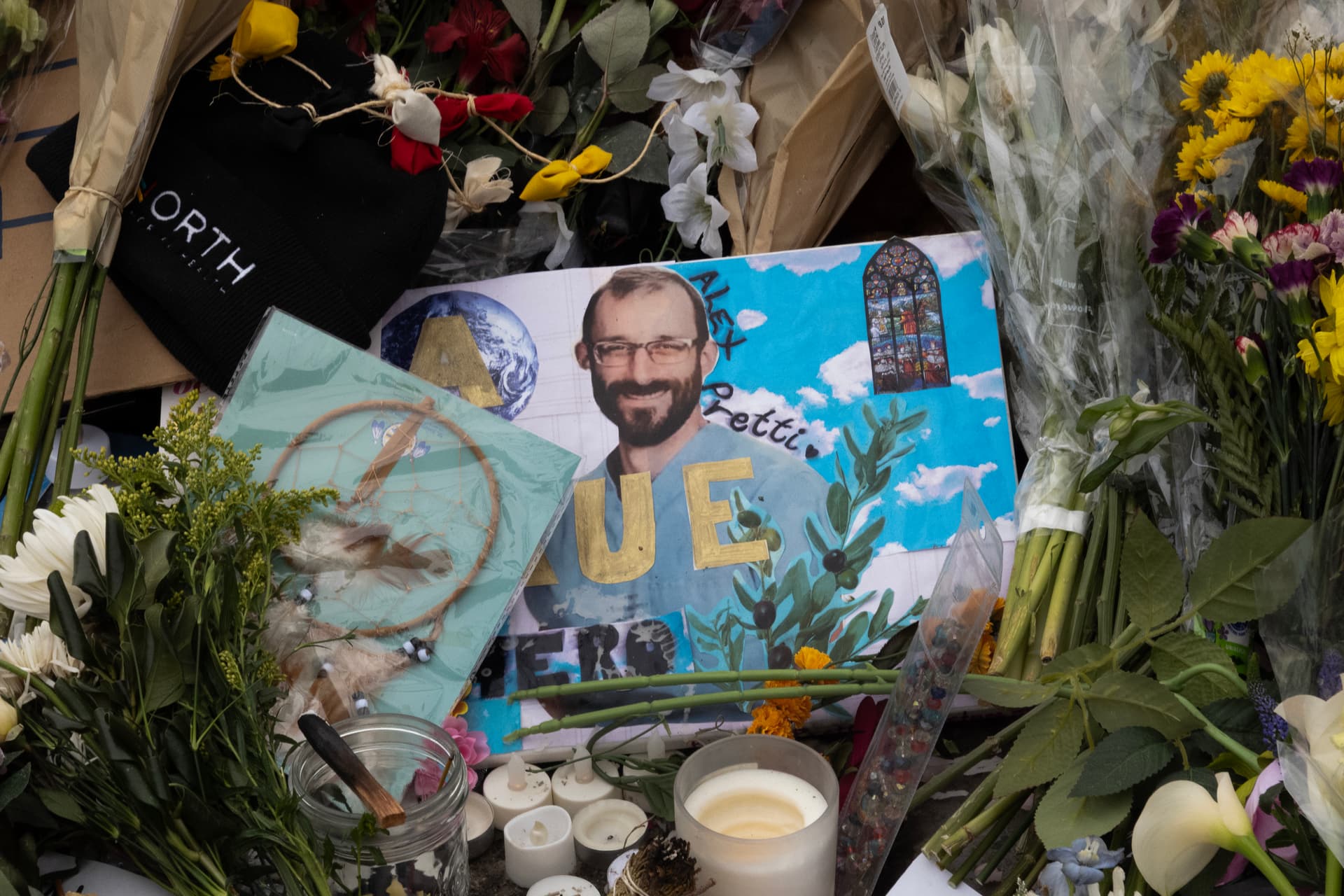 Mourners visit a memorial to Alex Pretti on January 26, 2026.  