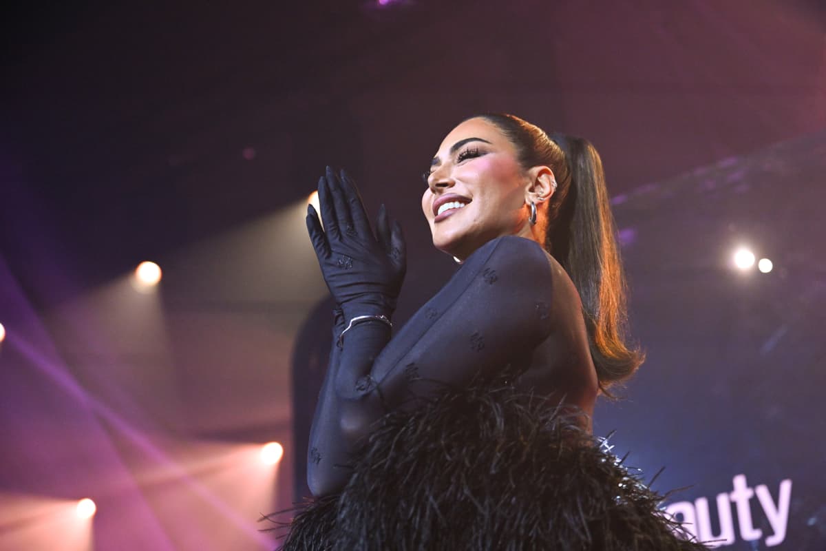 Huda Kattan speaks on stage during the Huda Beauty Easy Bake Pressed Event at Armani Hotel, Downtown Dubai on January 14, 2026.