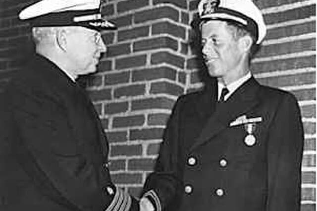 Lieutenant John F. Kennedy  receives the Navy and Marine Corps medal for his role in the rescue of the crew of PT 109 on August 2, 1943.