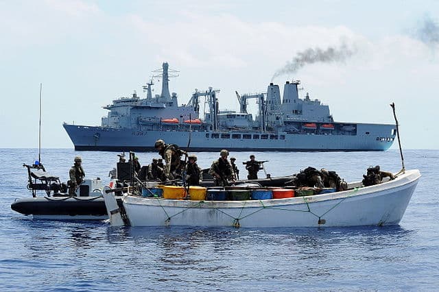 British Royal Navy and Royal Marines commandos board a Somali whaler suspected of being operated by pirates in the Indian Ocean on November 28, 2011.
