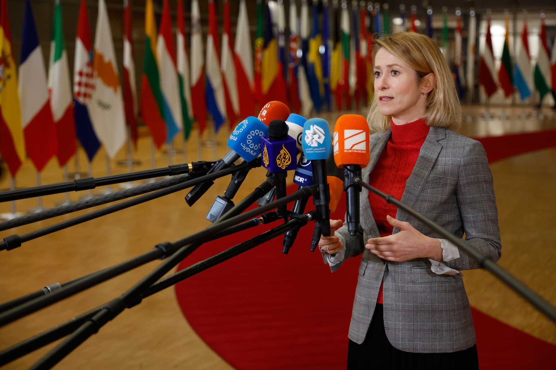 European Union foreign policy chief Kaja Kallas speaks with the media as she arrives for a meeting of EU foreign ministers at the European Council.