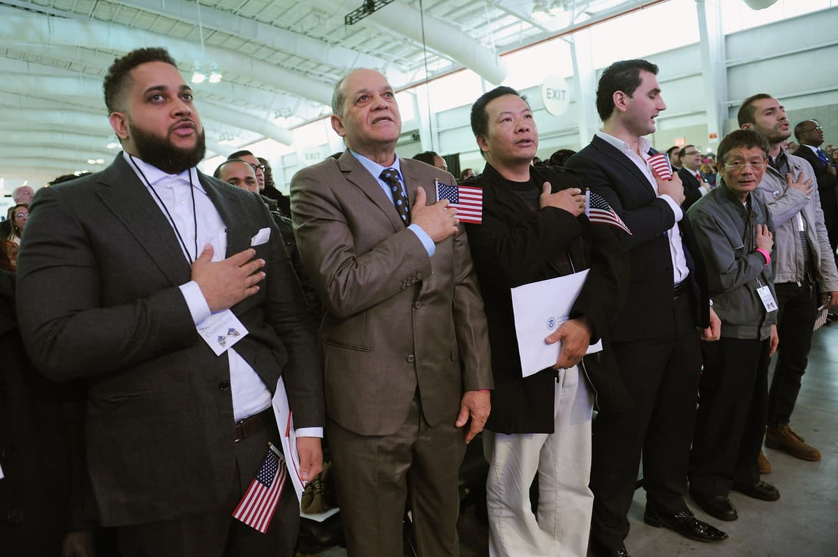 New American citizens at a naturalization ceremony on October 18, 2015 at New York City. 