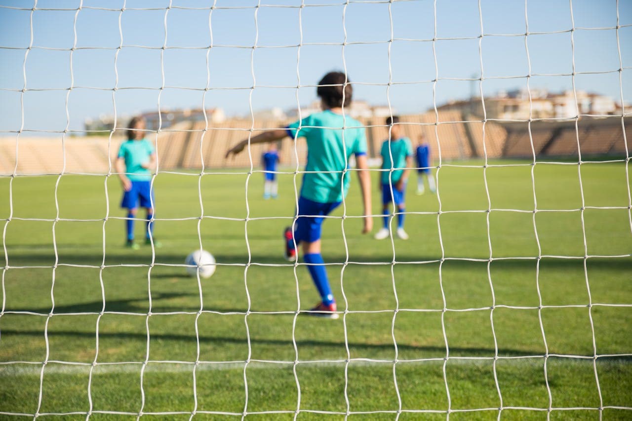 Children playing soccer.