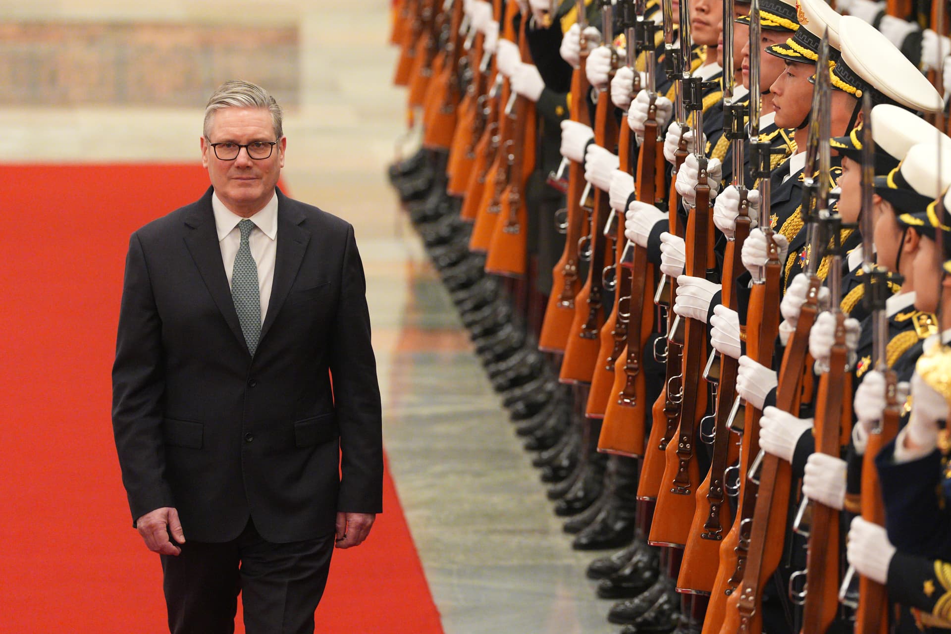 British Prime Minister Keir Starmer attends a ceremonial welcome ahead of his meeting with with Li Qiang, Premier of the People's Republic of China, at the Great Hall of The People.