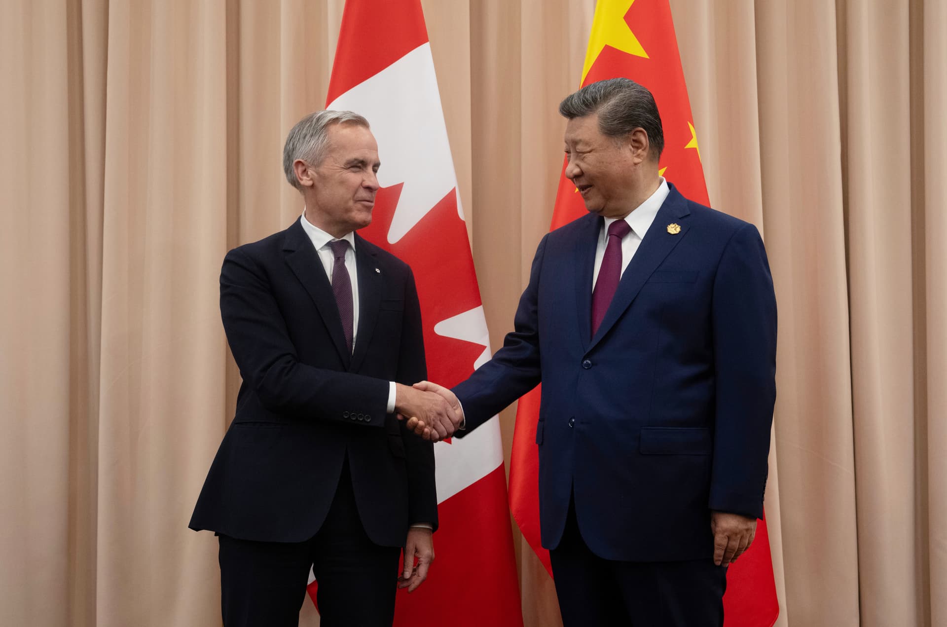 Canada's prime minister, Mark Carney, left, shakes hands with Chinese President Xi Jinping at the start of a meeting at Gyeongju, South Korea in October.