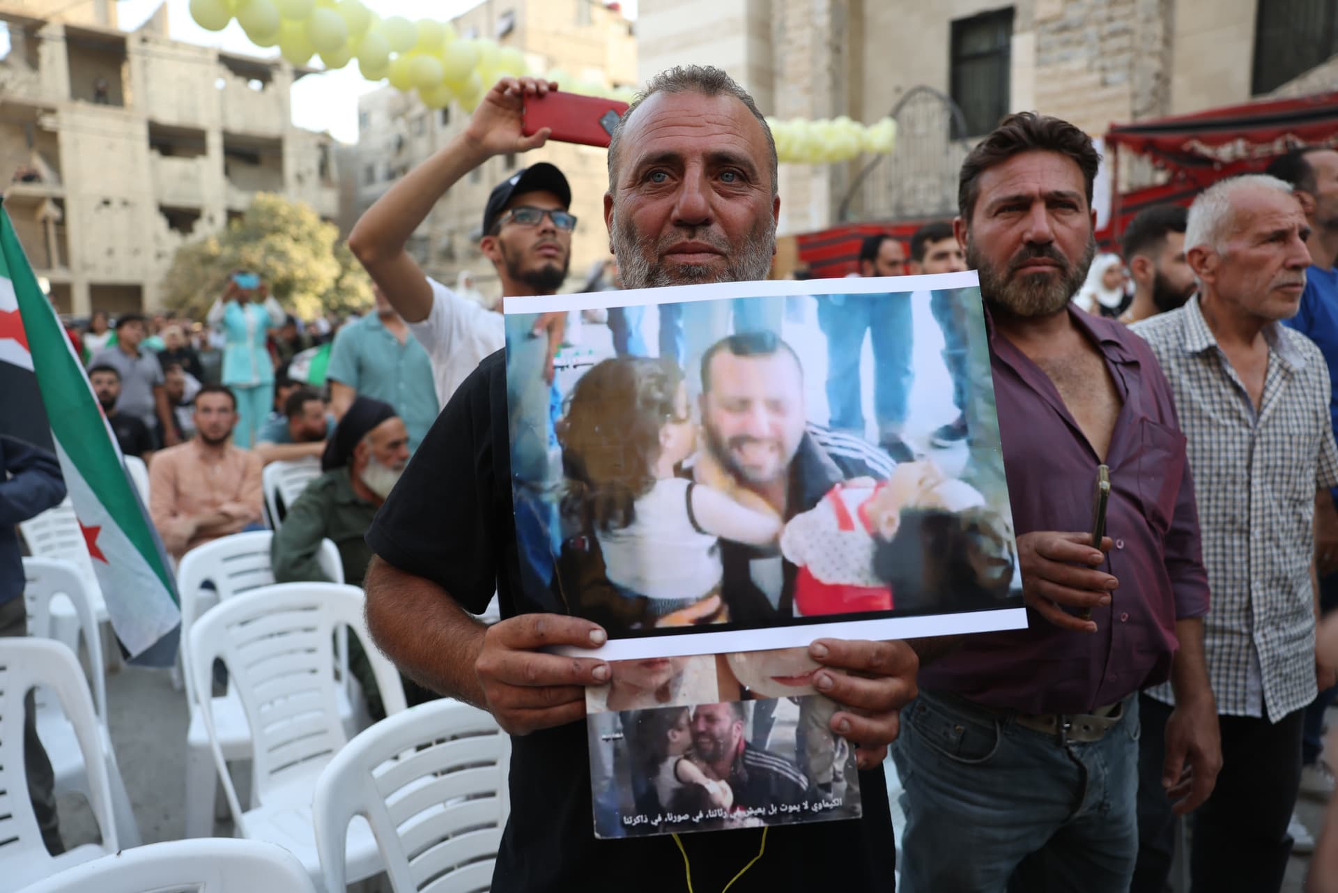 On August 21, 2025 at Zamalka, Syria, demonstrators mark the 12th anniversary of a chemical attack by Syrian Forces.