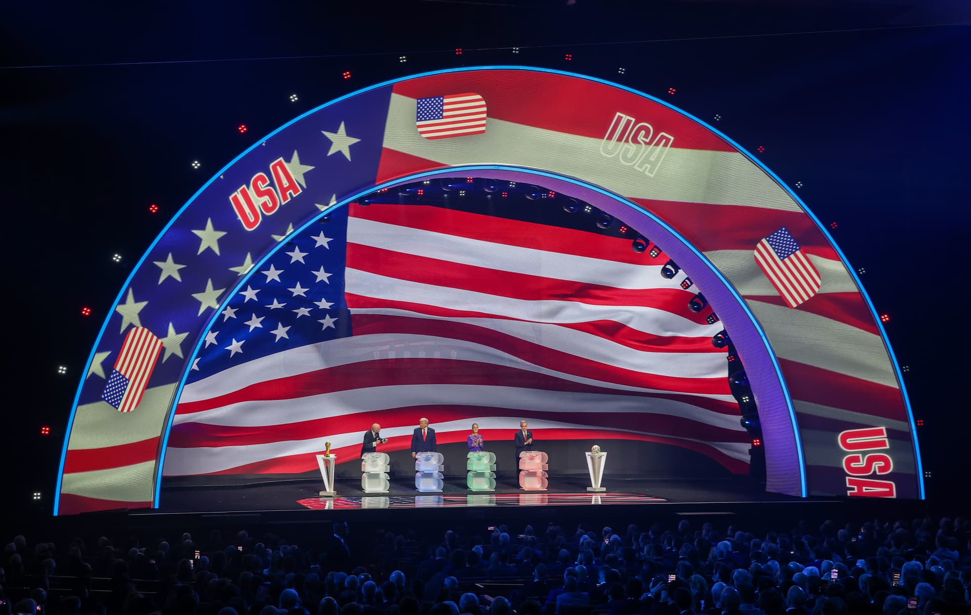 President Trump, Claudia Sheinbaum, President of Mexico, and Mark Carney, Prime Minister of Canada, stand on stage with Gianni Infantino, President of FIFA, during the FIFA World Cup 2026 Official Draw at John F. Kennedy Center for the Performing Arts on December 5, 2025 in Washington, D.C. 