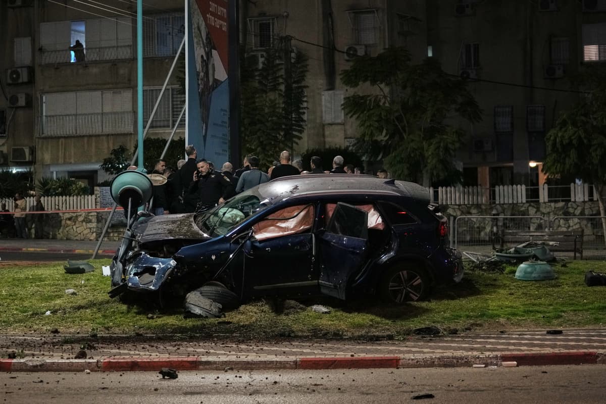 Israeli police investigate a deadly crime scene in the mixed Arab-Jewish town of Lod in central Israel, where a gunman fired on a car, killing one person and injuring two others, January 31, 2026. 