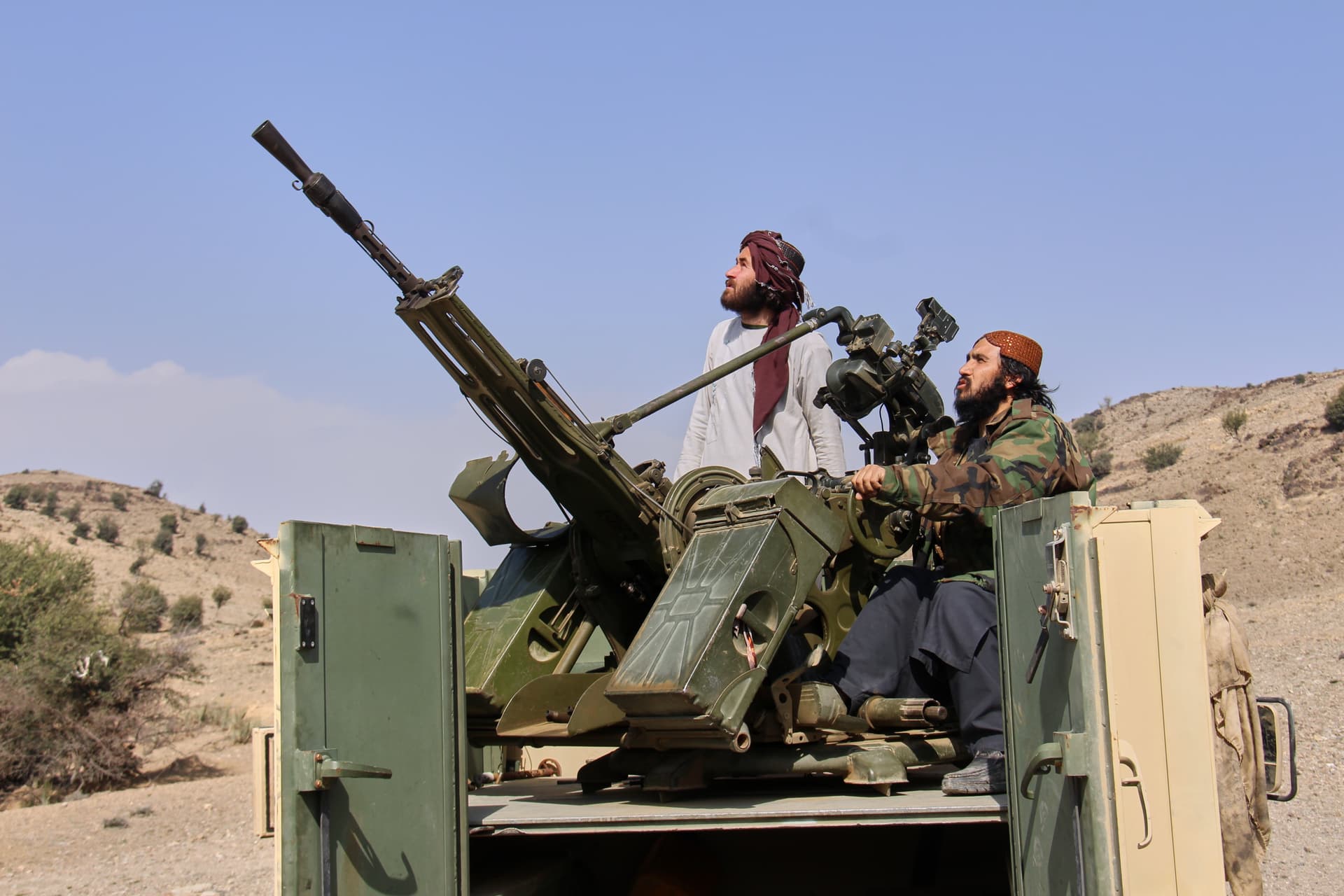 Taliban fighters man an armed pickup truck at the Afghan side of the Ghulam Khan crossing with Pakistan in Khost province, Afghanistan, on February 27, 2026.