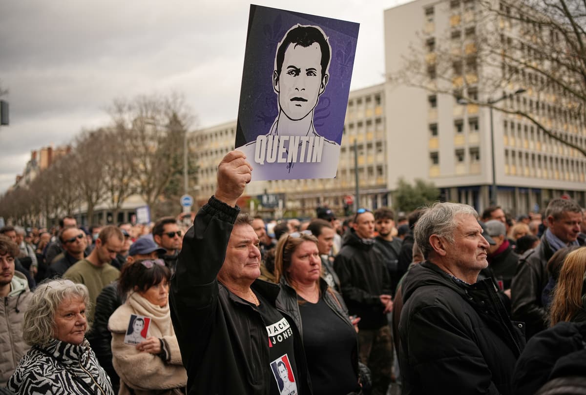 Protesters march to pay tribute to right-wing activist Quentin Deranque at Lyon, France, on February 21, 2026.