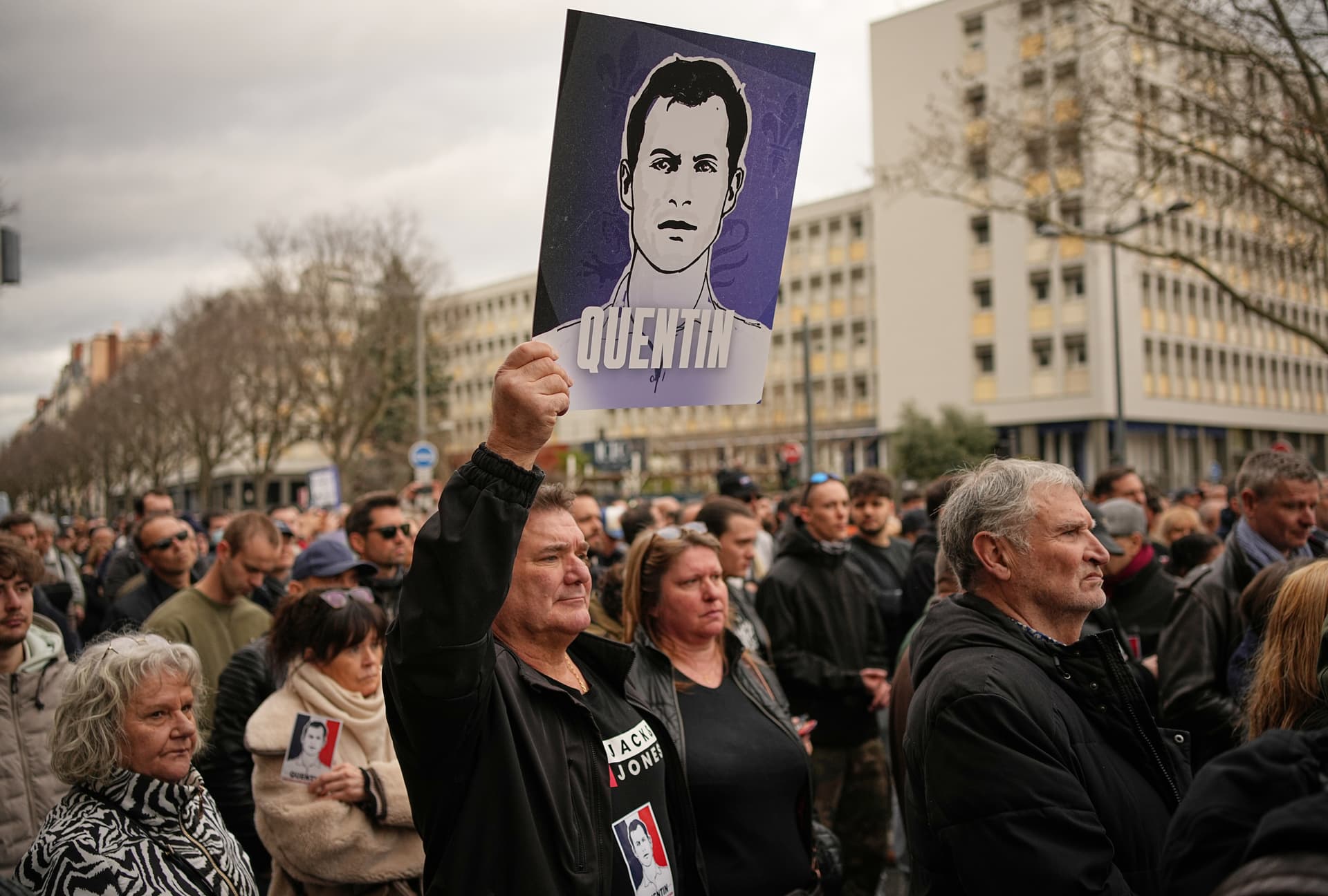 Protesters march to pay tribute to right-wing activist Quentin Deranque at Lyon, France, on February 21, 2026.