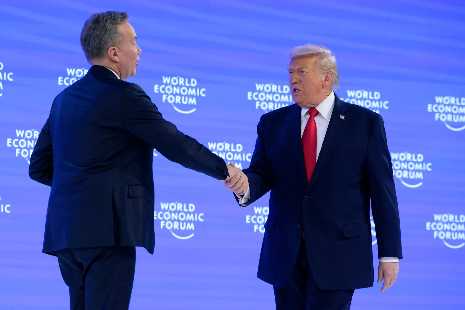 President Trump is greeted onstage by CEO of the World Economic Forum Børge Brende before giving a speech at the World Economic Forum (WEF) on January 21, 2026 at Davos, Switzerland. 